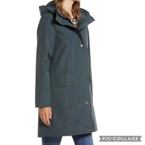 Green Barbour rain jacket with hood in perfect condition.